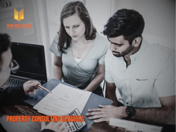 Team Meeting discussing Real Estate Portfolio